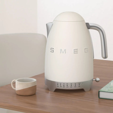 Variable Temperature Electric Kettle 1.7L With Fast Boil 1400W for tea or coffee nerds on a wooden table, retro cream finish.
