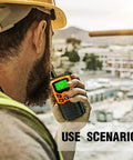 Construction worker using Long Range Walkie Talkies For Adults 2 Pack With 22 FRS Channels 99 CTCSS Privacy Tones VOX LCD Display