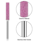 Close-up of a pink grinding burr stone with stainless steel shank, part of 50 Pcs Chainsaw Sharpener Bits With Box Set For Chain Saw Maintenance.