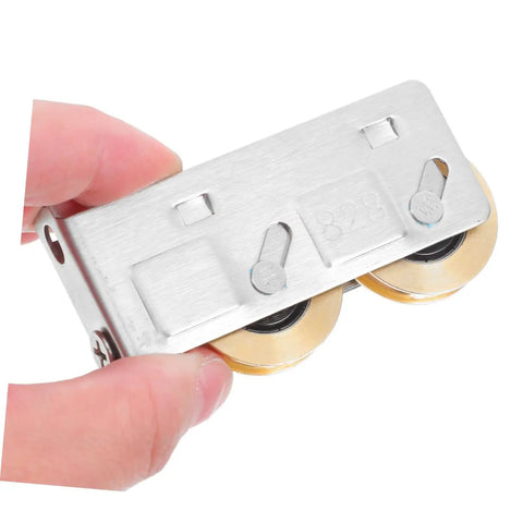 Rock Solid Heavy Duty Double Wheel Sliding Door Pulley Two Pack Stainless Steel Roller Kit, close-up of pulley with copper bearings.