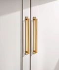 Kickass Square Cabinet Handles 10 Pack Featuring Three Inch Screw Spacing And Brushed Champagne Gold Zinc Alloy Furniture Pulls For Kitchen Cabinets Dressers And Closets close-up on two square cabinet handles.
