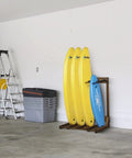 Rustic Burnt Wood Freestanding Surfboard Rack, 4 Foot Tall Vertical Stand For Indoor Storage, holds four boards in garage