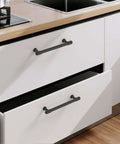 Score These Knockout Matte Black Cabinet Pulls And Drawer Handles For Updating Your Kitchen Or Bath Setup With Dependable Five Inch Center Spacing For Easy Install on white drawers.