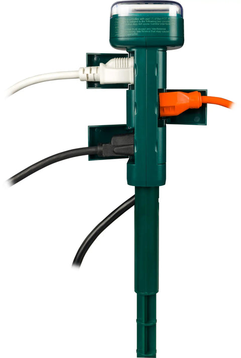 Rock Solid Outdoor Power Stake Timer With Six Grounded Outlets And Photocell Auto Switch For Yard Decor close-up of outlets and design