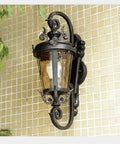 Classic Victorian Black Wall Sconce Waterproof Outdoor Porch Light Featuring E27 Edison Socket And Heavy Duty Aluminum Housing mounted on wall.