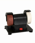 Compact Electric Mini Bench Grinder Featuring Non Slip Grip For Tough Sharpening And Smooth Polishing Tasks A Badass Addition To Any Home Workshop For Weekend Mechanics Who Dig Clean Cuts Every Time view with red and white grinding wheels on black base.