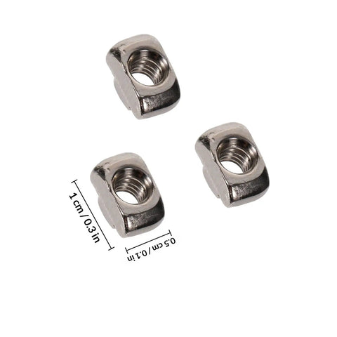 180 Pc Rock Solid Hammer Head T Slot Nuts Fasteners For Aluminum Extrusion And Cabinet Framing Nickel Plated Heavy Duty, close-up of three nickel coated nuts.