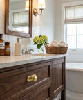 Two Pack Brushed Brass Cabinet Knobs With Satin Gold Vintage Backplate For Kitchen Drawers Bathroom Vanities And Bedroom Furniture on wooden vanity.