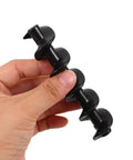 Hand holding black Spiral Shaft Replacement Kit For Chocolate Fountain 4pcs Feed Rods For Home And Small Business Fondue Machines