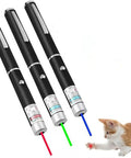 Three Pack Laser Pointer For Cats And Dogs Interactive Pet Toy Set With Red Green And Purple Lights Great For Playtime And Training Requires Two AAA Batteries Not Included, showing three laser pens and a kitten playing.