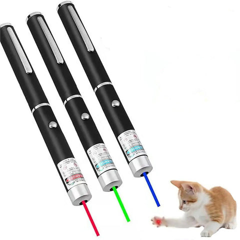 Three Pack Laser Pointer For Cats And Dogs Interactive Pet Toy Set With Red Green And Purple Lights Great For Playtime And Training Requires Two AAA Batteries Not Included, showing three laser pens and a kitten playing.