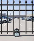 Rock Solid Sliding Door Roller Assembly With Quiet Rubber Wheels 600 Lbs Heavy Duty Load mounted on a black fence gate.