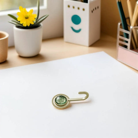 Pack Of 4 Self Adhesive Wall Hooks Featuring A Vintage Diamond Design on a desk with stationery, flower pot.