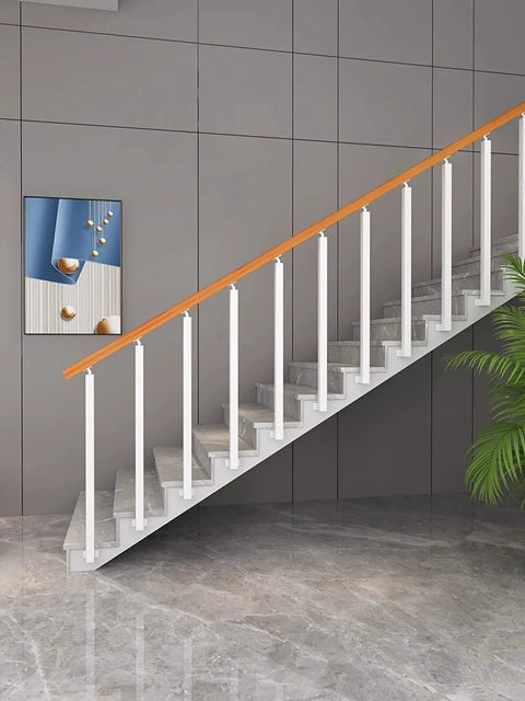 Top Shelf Side Mount Stair Railing Posts And Dead Simple Setup Deck Balusters With Pre Drilled Floor Screw Kit Plus 25 Pack Of 45 Inch Metal Spindles For Balcony Patio Hallway Railing System with white balusters and wooden handrail.