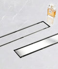 32 Inch Brushed 304 Stainless Steel Linear Shower Drain with Tile Insert 2 In 1 Panel on marble bathroom floor
