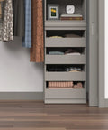 Super Slick Modular Closet Storage Organizer With Four Stackable Drawers In Taupe with folded clothes visible inside.