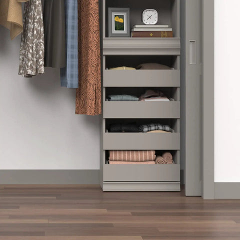 Super Slick Modular Closet Storage Organizer With Four Stackable Drawers In Taupe with folded clothes visible inside.