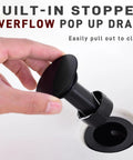Matte Black Two Handle 8 Inch Widespread Bathroom Faucet overflow drain being removed for cleaning