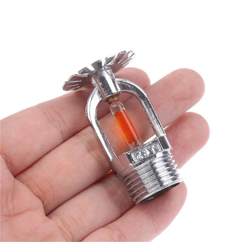 Side Hidden Fire Sprinkler Head Concealed Design With 57C Rapid Activation For Vertical Down Spray Pro Grade Fire Protection in hand.