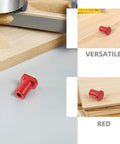 Red bench dog of Six Piece Aluminum Bench Dogs And Table Clamp Set With Low Profile Stops for woodworking on wood surface