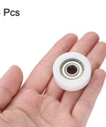 Heavy Duty Nylon Roller Bearings 8x32x12Mm Set Of Six Double Shielded Flat Pulley Wheels For Furniture Setup And Hardware Mods Runs Like A Dream Zero Friction Built Tough, displayed on a hand.