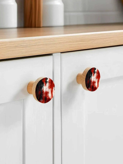 Dope Abstract Red And Black Cabinet Knobs Set 1.4 Inch Solid Beech Wood Drawer Pulls featuring two knobs on a kitchen cabinet.