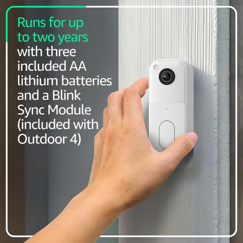 Wireless Smart Security Camera System With Video Doorbell Offering Two Year Battery Life Sync Module attached to wall.