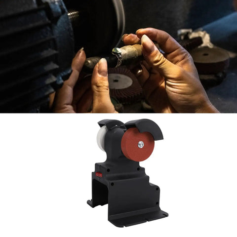 Hands using a mini bench grinder with dual coarse fine brown corundum wheels for sharpening metal tools.