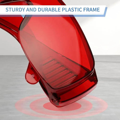 Anti Fog Dental Safety Glasses Ultra Lightweight Protective Eye Shields For Teeth Whitening Lights And Lab Work Fits Over Prescription Frames No Sweat Ventilation Built Tough For Range And Workshop Sweet Spot Comfort Red Lens Option with a sturdy red plastic frame.