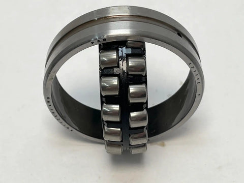 Heavy Duty Spherical Roller Bearing 22209ES TVPB W33 showing the spherical structure and polyamide cage, measures 45X85X23MM.
