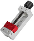 Compact Aluminum Mini Bench Vise For Woodworking Hobbyists, A Handy Little Table Clamp With 50mm Jaw Range, 123mm Overall Length, 20mm Mount Hole Distance, Ideal For Engraving, Drilling, And Small Repairs, shown angled open with red jaws