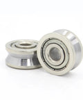4 Pcs UV Groove Pulley Wheel Guide Bearings Heavy Duty Smooth Operator Built Tough For High Speed Low Noise Operations Durable Wear Resistant Design Handling The Heat So You Can Tackle Heavy Loads Without Any Hassle, close-up view of steel pulley bearings.