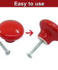 Bold Red Ceramic Cabinet Knobs Set Featuring No Sweat Installation And Top Notch Durability For An Instant Kitchen Glow Up And Quick Drawer Fix Including Premium Fasteners And Driver Ready For Your Next Weekend DIY Project Today showing two red ceramic knobs and screws.