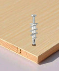 Tool Free Self Drilling Drywall Anchors Kit 100 Pcs Zinc Hollow Wall Anchors with Screws shown on wooden board