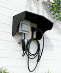 Built Tough Aluminum EV Charger Cover And All Weather Sun Shield For Wall Mounted Electric Vehicle Stations installed on a white wall.
