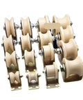 Image of multiple Single Nylon Groove Roller Wheels for Sliding Barn Doors Linear Track Pulley system, made of nylon and metal.