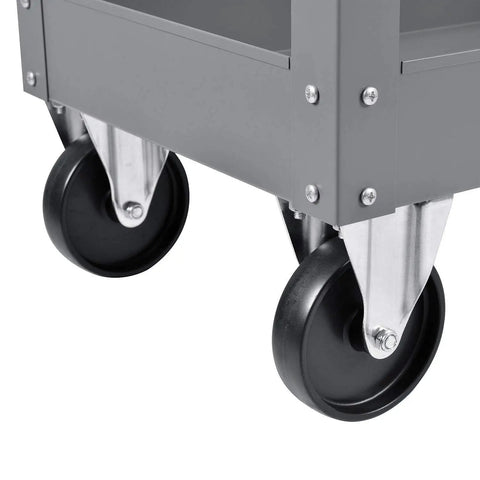 Rock Solid Heavy Duty Steel Storage Cart With Two Roomy Deep Trays Carries Five Hundred Pounds Flawlessly For Workshop Garage Or Warehouse Tool Organization And Effortless Rolling In Gray wheels close-up view.