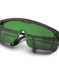 Heavy Hitter IPL Laser Safety Glasses With Anti Blue Light Filter For Hair Removal And Salon Procedures showing green lenses and black frame.