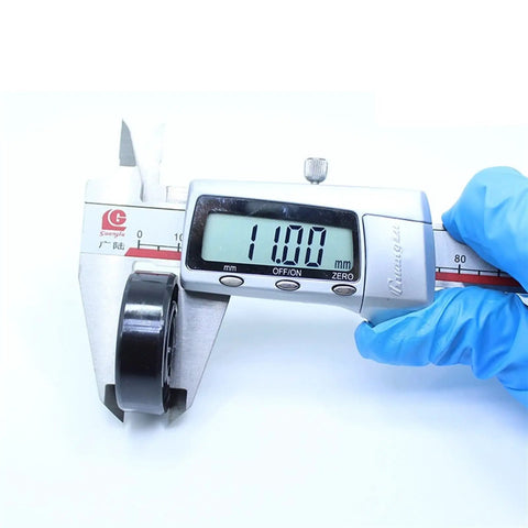Tough As Nails High Temperature Bearing 6202 15mm X 35mm X 11mm Double Sealed measured with caliper showing 11mm.