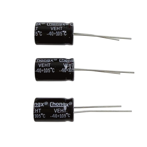 Pro Grade Aluminum Electrolytic Capacitor Assortment Kit Featuring 22 Values From 1UF To 100UF Across 100V 250V And 400V Ratings, showing three black capacitors.