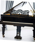 Smooth Riding Vintage Brass Plate Casters Four Pack For Furniture Wheels Featuring Sturdy Ball Bearings And Hardwood Safe Non Marking Rollers Heavy Duty Rustic Hardware Upgrade Set on a vintage grand piano with ornate details.