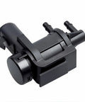Front view of black plastic 4x4 hub lock actuator with dual vacuum hose fittings.