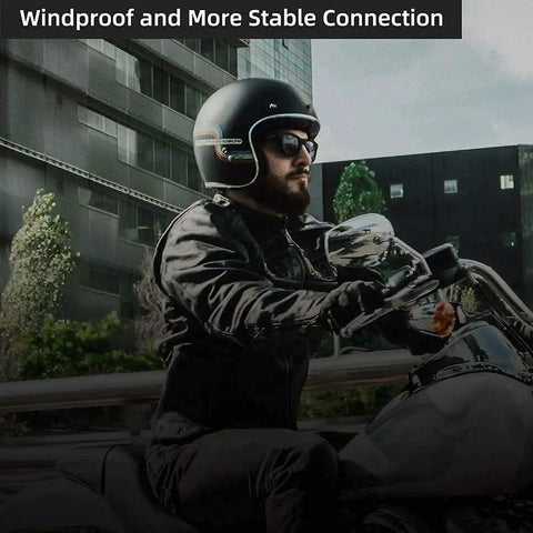 Motorcyclist wearing helmet with Motorcycle Helmet Bluetooth Headset with Waterproof Sports Sound System Hands Free Music.