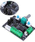 Front view of a stepper motor controller board with green screw-terminal blocks, blue jumpers, and a rotary knob on a black PCB