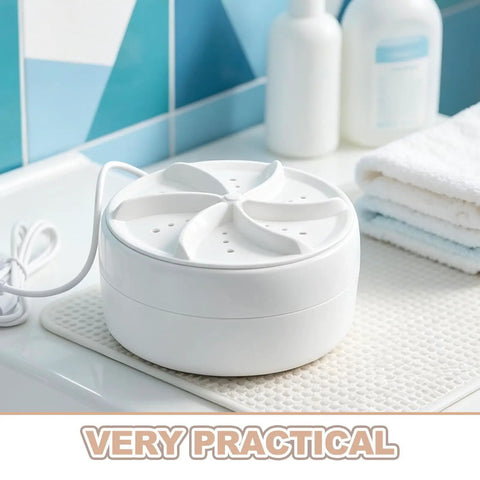 Portable Mini Turbo Washer Compact Automatic Laundry Beast For Dorm Rooms And Apartments Travel Friendly Design That Slaps With Rapid Spin Cycle making cleaning easy on a countertop.