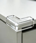 Clear PVC corner guard on table, 4 Pack Table Corner Protectors For Desks And Tables, Clear PVC Corner Guards With Anti Collision Design