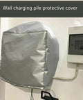 Premium Heavy Duty EV Charger Kickass Weather Protection Roof And Rain Deflector Cover For Outdoor Electric Vehicle Charging Cradles mounted on wall.