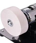 Mini Bench Grinder With Powerful 100 Watt Brushless Motor Delivers Tough As Nails Sharpening For Metal Wood And Diy Crafting Projects, showing the grinding wheel.