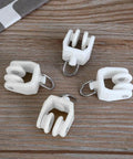 Fifty Piece Heavy Duty Ceiling Curtain Track Rollers With Flexible Bendable Clips And Rock Solid Construction For No Fuss Sliding In Modern Home Spaces on a wooden surface.