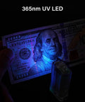 Image showing 365nm UV LED lighting up a $100 bill, demonstrating the Rechargeable EDC Flashlight With USB C 700 Lumen Dope Keychain Light's UV feature.